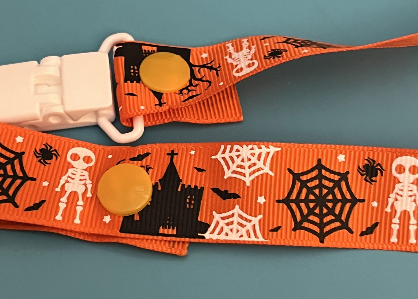 Orange Haunted House Paci Clip
