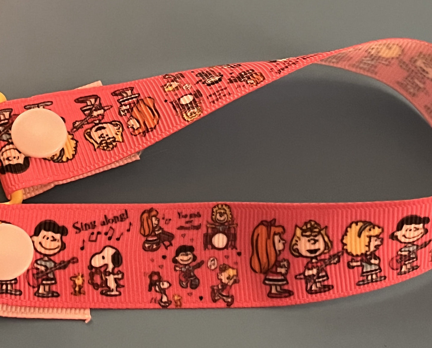 Pink Peanuts Paci Clip