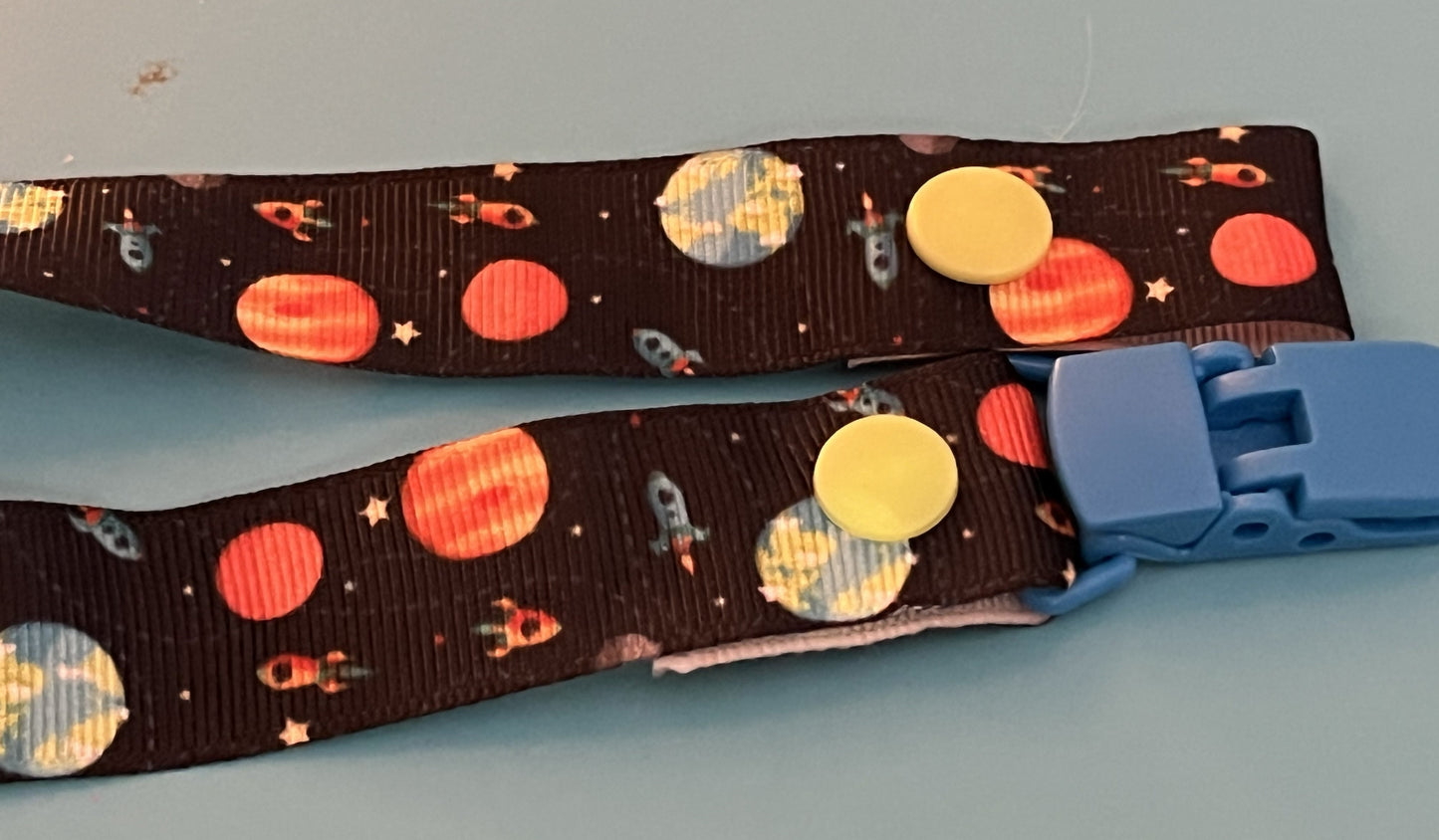 Planets Paci Clip